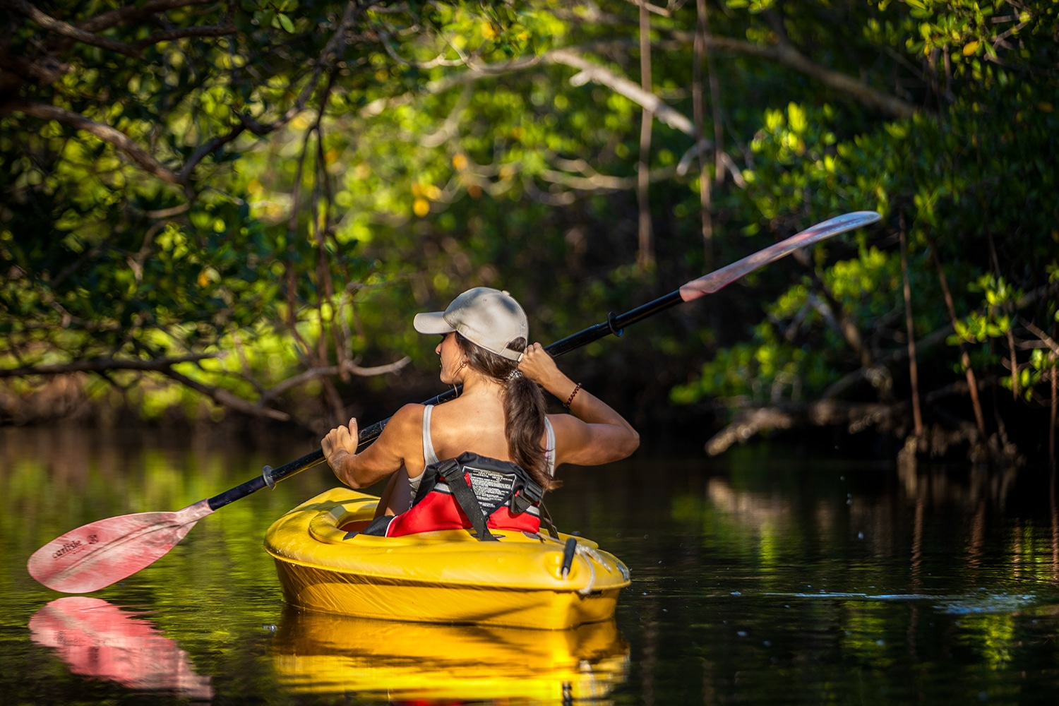 image of woman in kayak